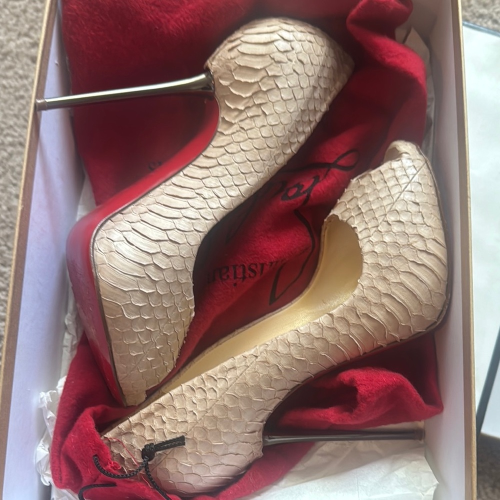Christian Louboutin Cream snake skin and metal heels